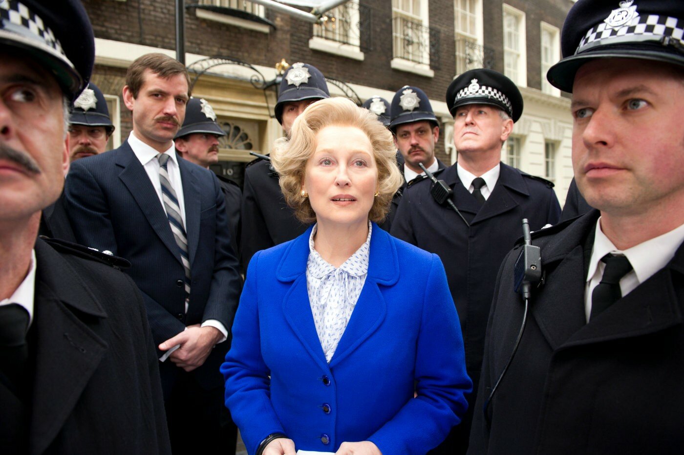 Thatcher (Meryl Streep) flanked by her police entourage. Image: 20th Century Fox